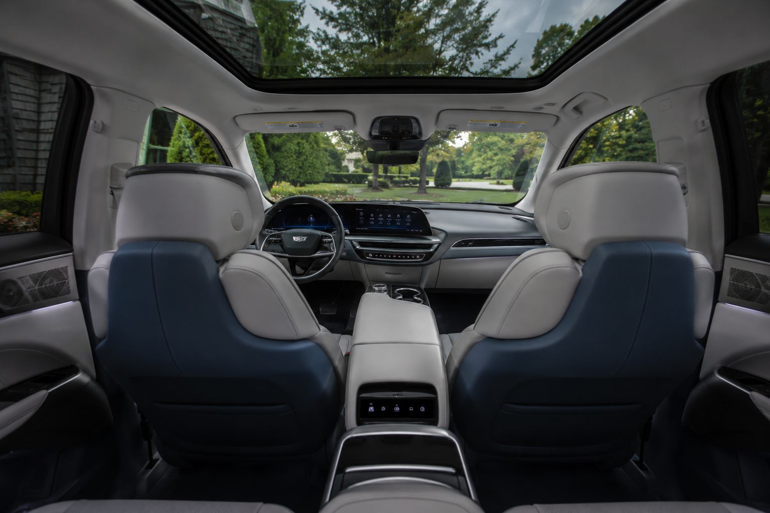 Cadillac Lyriq cockpit &middot; 33-inch curved-LED dash, dual-pane sunroof